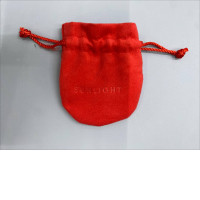 Red felt bag for jewelry.