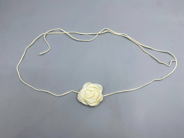 Rope choker necklace with camellia flower pendant. Rope choker necklace with camellia flower pendant.