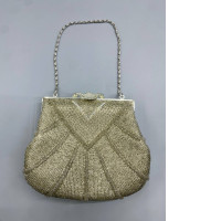 This shoulder bag is a vintage-style beaded handbag.