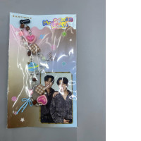 "EarthMix" beaded phone strap featuring decorative elements and a photocard of the Thai actors.
