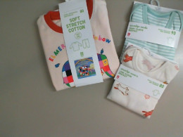 UniQlo set for 3 Clothes for Kids. 1 Long Sleeve bodysuit. 1 short sleeve bodysuit. 1 soft stretch cotton pajamas
