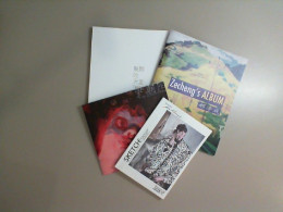 Set of 4 photobooks Set of 4 photobooks