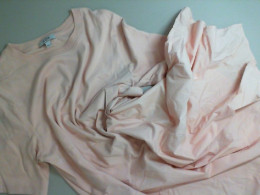 The dress is long and light