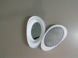 Hair comb with mirror