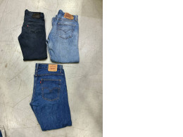 Set of 3 Levi's 505 regular fit jeans. jeans are Levi's 511 Slim Fit model.  Levi's 560 loose fit tapered jeans. 