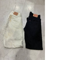 Set of 2 Levi's 501 Original Fit white jeans, from the 1990s, made in the USA.