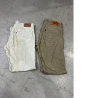 Set of 2 Classic straight-leg Levi's 501 jeans in brown. Vintage white Levi's 501 jeans.