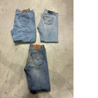 Set of 3 Levi's 550 relaxed fit jeans.  vintage Levi's 501 light-wash jeans. Levi's 501 classic jeans  