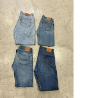 Set of 4 Vintage Levi's 550 Classic jeans and Levi's 501 jeans from the 1990s, straight leg, jeans are Levi's 501 Original fit,Levi's 505 Regular Fit jeans in a medium wash. Set of 4 Vintage Levi's 550 Classic jeans and Levi's 501 jeans from the 1990s, straight leg, jeans are Levi's 501 Original fit,Levi's 505 Regular Fit jeans in a medium wash.