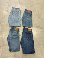 Set of 4 Vintage Levi's 550 Classic jeans and Levi's 501 jeans from the 1990s, straight leg, jeans are Levi's 501 Original fit,Levi's 505 Regular Fit jeans in a medium wash. Set of 4 Vintage Levi's 550 Classic jeans and Levi's 501 jeans from the 1990s, straight leg, jeans are Levi's 501 Original fit,Levi's 505 Regular Fit jeans in a medium wash.