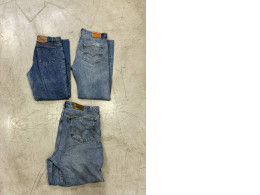 Set of 3 Levi's orange tab jeans, likely a 505 straight-leg model,Levi's 501 classic straight-leg jeans,vintage Levi's 550 Relaxed Fit tapered leg jeans. 