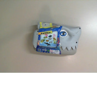 A toy shark, a set of marine animal figurines