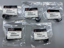 Set of 5 Mitsubishi 8264A227 is a gasket for the headlight washer motor.