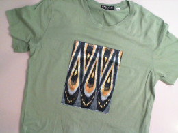 Green T-shirt with applique