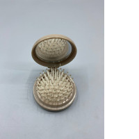 Portable folding hairbrush