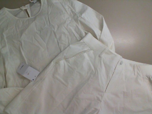Women's white suit, blouse and shorts Women's white suit, blouse and shorts