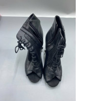 Black high-heeled boots for women.