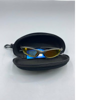Cycling sunglasses in a glasses case. Cycling sunglasses in a glasses case.