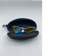 Cycling sunglasses in a glasses case.