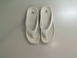White rubber flip flops White rubber flip flops