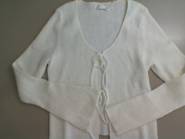 White women's tie-up sweater