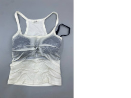 A white racerback tank top from 22 basic studio.