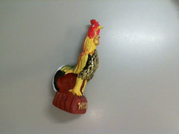 Ceramic rooster figurine