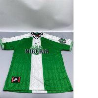 Green collared sports shirt with white stripes