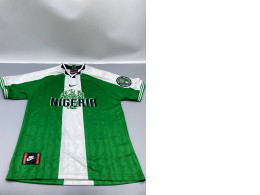 Green collared sports shirt with white stripes