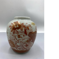 Japanese Kutani ware porcelain vase featuring a red and gold hand-painted design of a peacock amidst peonies. 