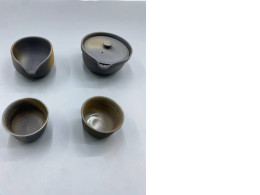 Set of 4 Tokoname Shiboridashi tea set, a traditional Japanese style designed specifically for brewing high-grade teas like Gyokuro at lower temperatures. Set of 4 Tokoname Shiboridashi tea set, a traditional Japanese style designed specifically for brewing high-grade teas like Gyokuro at lower temperatures.