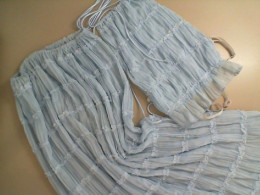 Women's blue suit, skirt and top