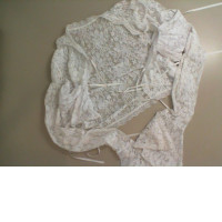 Transparent blouse with ties and long sleeves Transparent blouse with ties and long sleeves