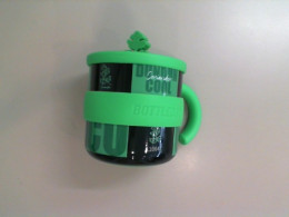 Green plastic mug with silicone handle Green plastic mug with silicone handle