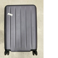 The gray suitcase is likely the Xiaomi Luggage Classic Pro model.