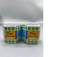 Set of 2 White Tiger Balm is a herbal ointment for relieving pain.