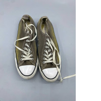  green Converse Chuck Taylor All Star sneakers. 