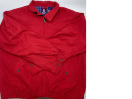 vintage Chaps Ralph Lauren men's red Harrington jacket, featuring a full zip closure and tartan plaid lining. vintage Chaps Ralph Lauren men's red Harrington jacket, featuring a full zip closure and tartan plaid lining.