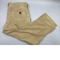  vintage Carhartt B11 carpenter pants in tan canvas. 