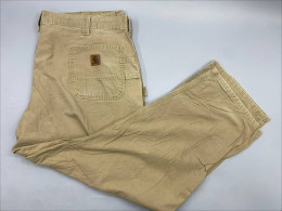  vintage Carhartt B11 carpenter pants in tan canvas. 