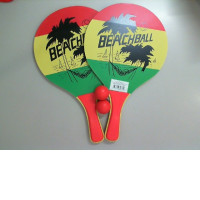 A set of wooden rackets + 2 balls