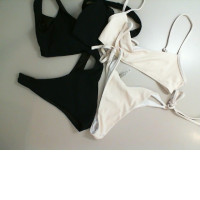 Set of 2 women's swimsuits, white and black
