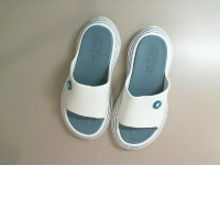 White rubber flip flops