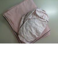 Pink bed linen, bedspread and sheet
