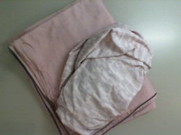 Pink bed linen, bedspread and sheet Pink bed linen, bedspread and sheet