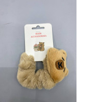 plush capybara-themed hair scrunchie.