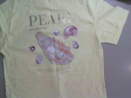 Yellow T-shirt with a shell