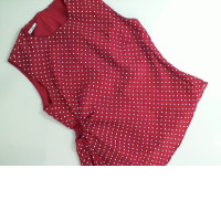 Red sleeveless blouse