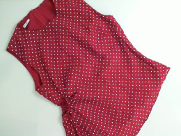 Red sleeveless blouse Red sleeveless blouse
