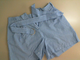 Blue fabric shorts with a belt